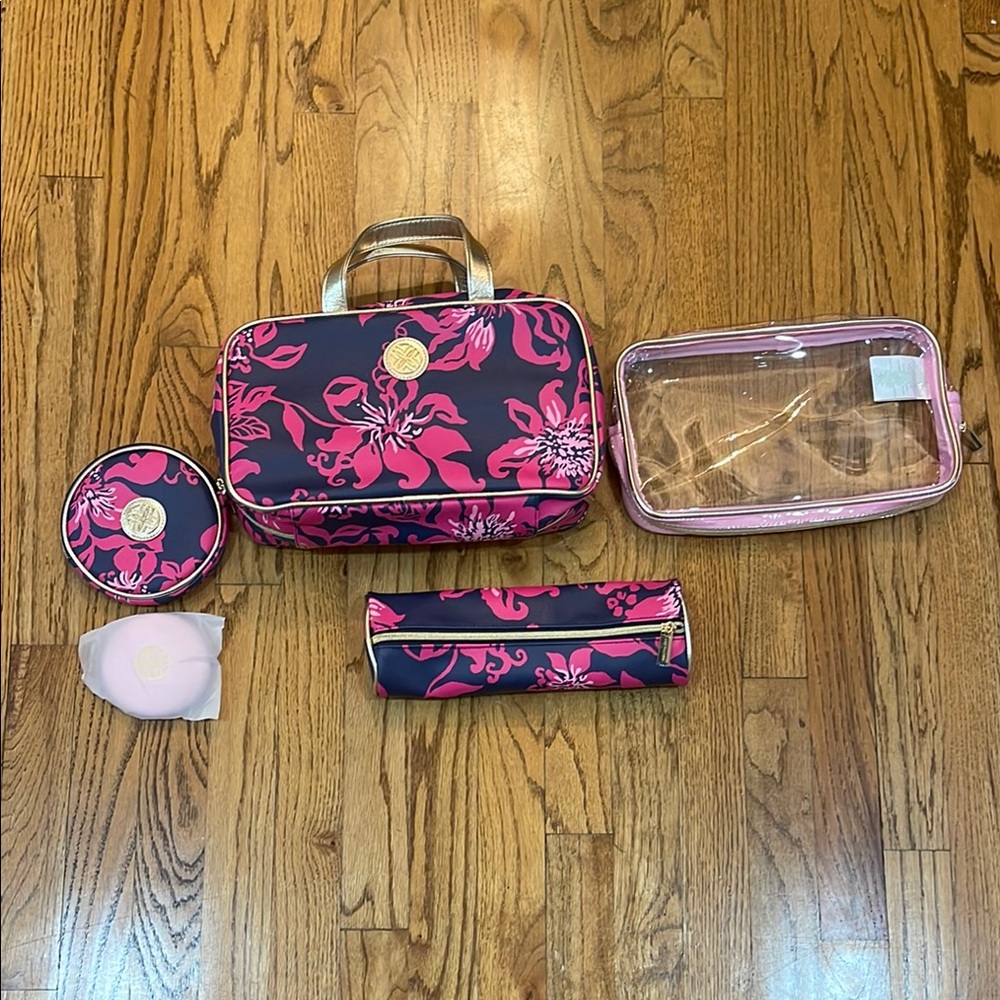 Lilly Pulitzer GWP set of 5 NWT
Makeup bag with mini bags
Travel mirror